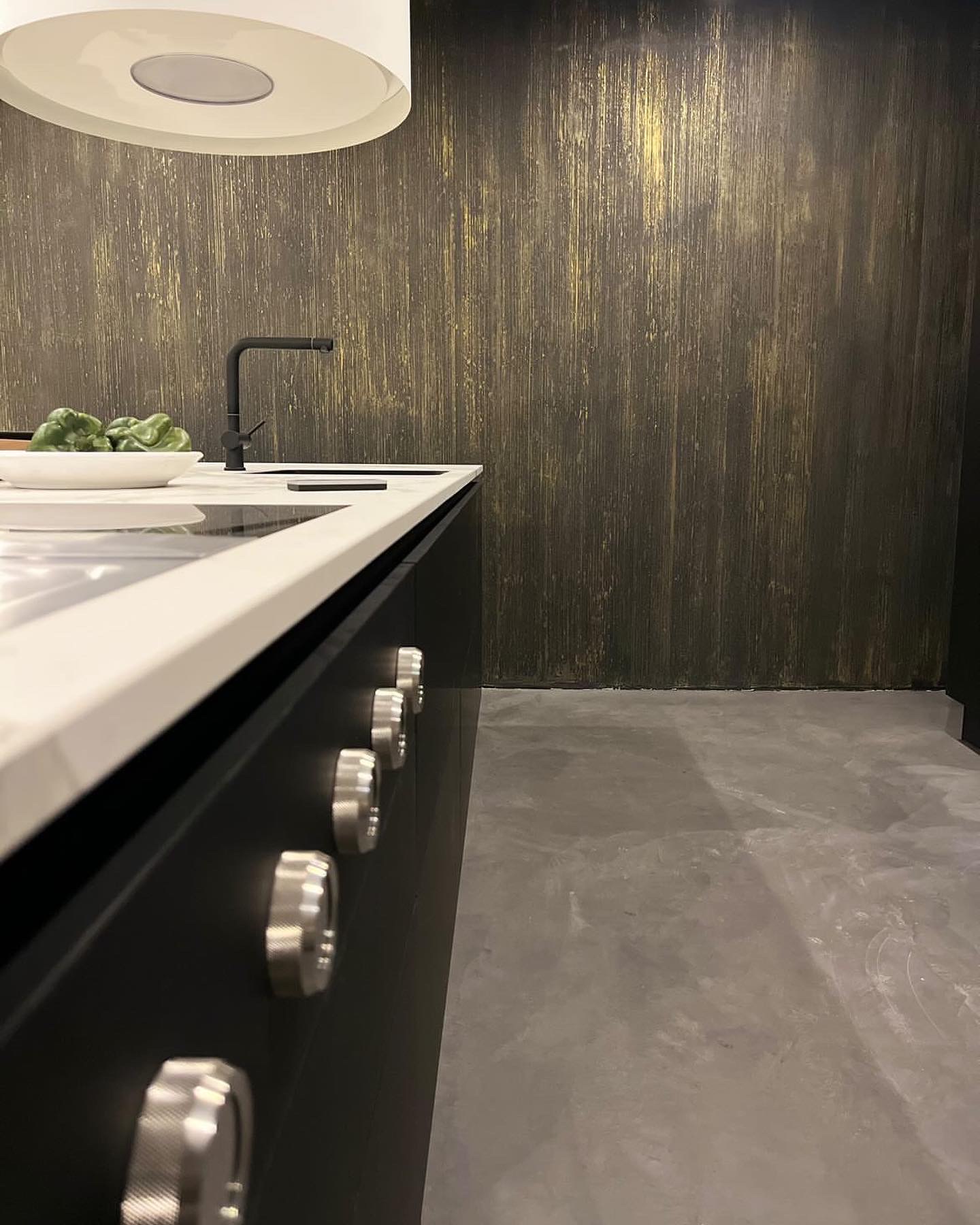 Close-up Gocce D'Oro druppeltextuur met goudaccenten